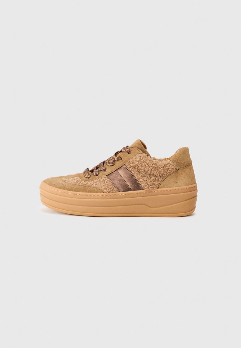 Sneakers featuring a tan suede upper with a textured beige fabric area, dark brown leather stripes, and a thick tan rubber sole.