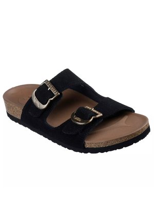 Sandalia tipo slide de ante negro con dos hebillas de metal ajustables, plantilla marrón contorneada y media suela de corcho texturizado.