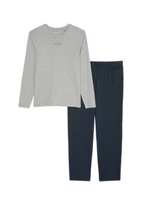 Chemise grise à manches longues avec logo en texte, associée à un pantalon avec ceinture élastique bleu marine. Les deux articles sont fabriqués en tissu doux.
