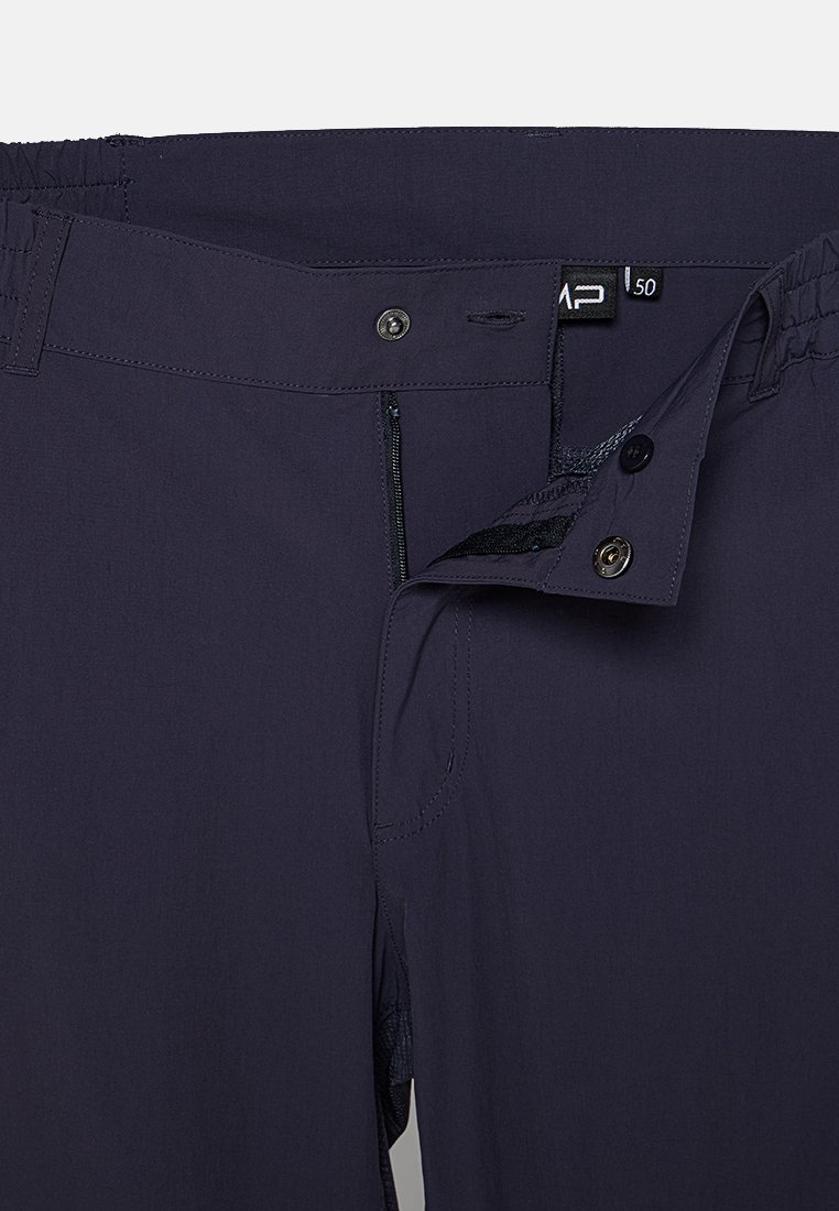 Pantalones oscuros de un navy intenso con una textura suave, que presentan un cierre de cremallera y botón, una cinturilla elástica y detalles de costura mínimos.