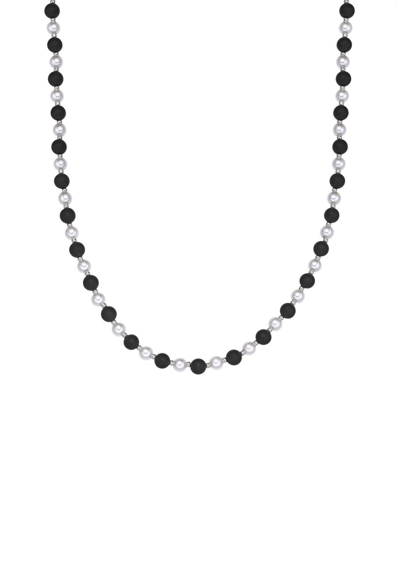 Zwart-witte kraalcollier met afwisselend matte zwarte en glanzende witte kralen, gerangschikt in een symmetrisch patroon.