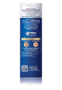 NIVEA Men Power moisturizing cream packaging showing anti-pigment, wrinkle reduction, SPF 30 features, and before-after skin improvement images.