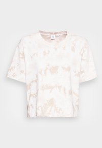 Tílko s krátkým rukávem a zkráceným střihem v béžovém tie-dye vzoru. Vyrobeno z jemné bavlny, má kulatý výstřih a volný střih.