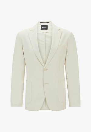 Svetlo béžový blejzer vyrobený z textúrovanej tkaniny. Má výstrih so zářezmi, dva predné vrecká a jedno gombíkové zapínanie.