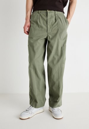 TRANSNOMADICA™  - Trousers - hard twist sage