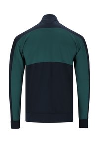 Lättvikts zip-up jacka med en färgblockdesign i mörk marinblått och gröna paneler. Hög krage och ribbade manschetter för en snug passform.