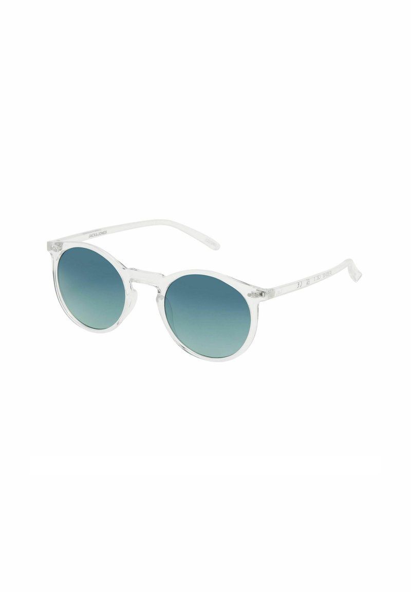 Gafas de sol redondas con montura transparente y lentes en degradado de color teal. Los detalles incluyen brazos delgados y un sutil logo en el lateral.