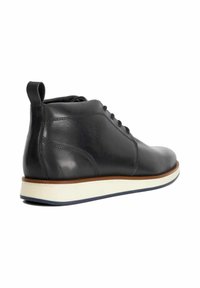 Black leather ankle boot with rounded toe, lacing, and pull tab. White rubber sole with blue accent. Smooth texture and sleek design.