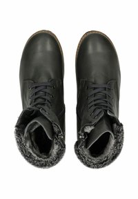 Bottines en cuir noir avec doublure en fausse fourrure grise, conçues avec un devant à lacets et des zippers latéraux pour un accès facile. Semelles en caoutchouc plates.