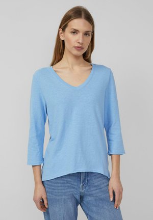 - Bluzka z długim rękawem