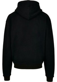 Sudadera negra con un tejido texturizado, con capucha forrada, puños acanalados y dobladillo recto, diseñada para un ajuste relajado.