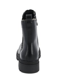 Botas de tobillo de cuero negro con un acabado suave, que cuentan con una cremallera lateral y una suela de goma texturizada para mayor agarre. Diseño sencillo y redondeado.