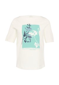 Vit bomulls t-shirt med rund hals och korta ärmar. Har en teal rektangulär grafik med blommönster och stiliserad text längst ner.
