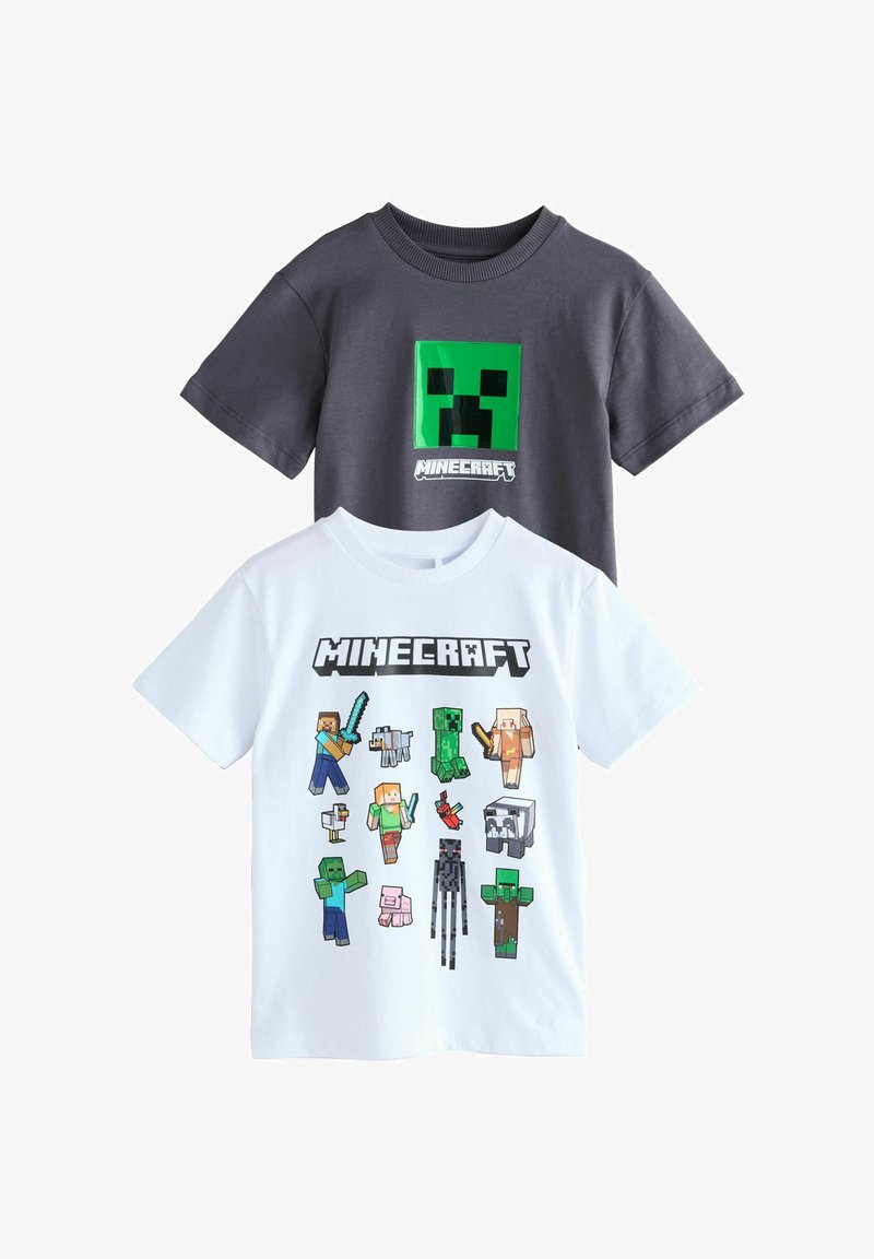 Two Minecraft-themed short sleeve t-shirts, one dark with a green Creeper face and one white with various Minecraft characters and logo.