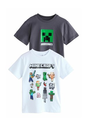 Dva majiće kratkih rukava. Jedna siva s grafikom Minecraft Creepera u zelenoj boji; druga bijela s raznim pixeliziranim Minecraft likovima.
