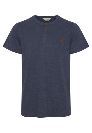 Navy blue short-sleeve shirt with a henley neckline, three buttons, and a small brown logo patch on the left chest. Soft fabric texture.