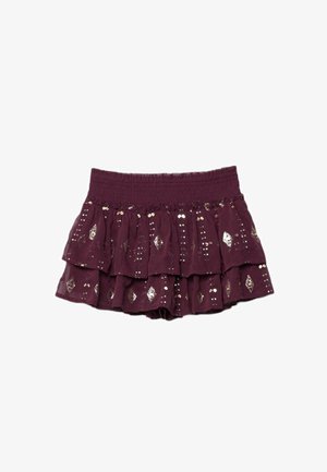 Violetti kerroksittainen hame, jossa on kuminauhavyötärö ja pystysuorat rivit hopeisista paljeteista tehtyjä timantinmuotoisia kuvioita.