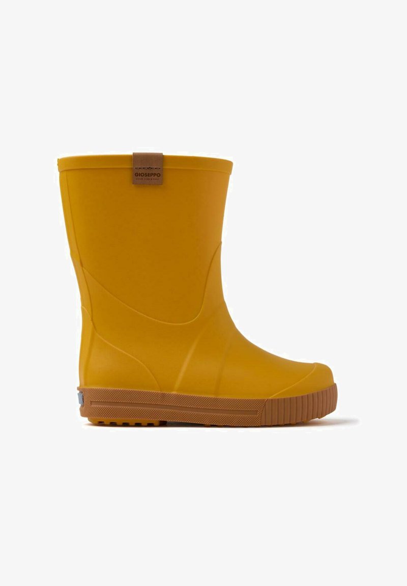 Botte de pluie en caoutchouc jaune avec une texture lisse, un haut arrondi et une semelle en caoutchouc marron dotée d'un motif strié pour une meilleure adhérence. Étiquette de logo attachée.