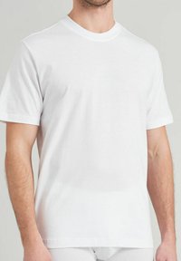 White cotton t-shirt with short sleeves, crew neck, and a smooth texture. Simple design, no visible patterns or markings.
