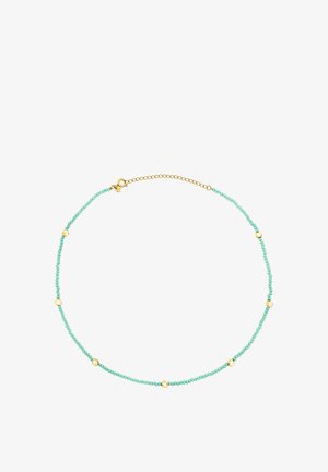 Collier en perles turquoises avec accents dorés, perles circulaires et une chaîne délicate avec un fermoir à homard.