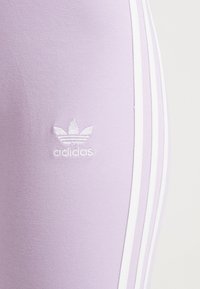 adidas Originals Legíny - kalhoty  - purple