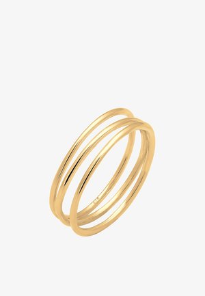 Anello a tre fasce tono oro con finitura liscia e lucida e design minimalista, marcato "925" per la base in argento sterling.
