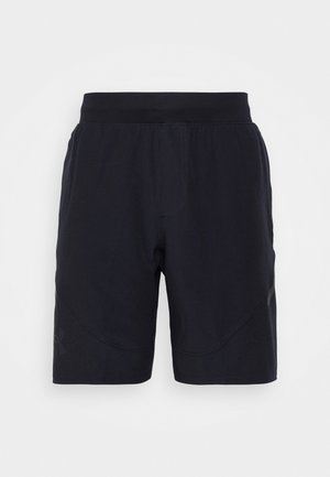 Marineblauwe sportshorts met een elastische tailleband, zachte stof en subtiele zijnaden. Beschikt over een logo op het linkerpand. Middelste hoogte.