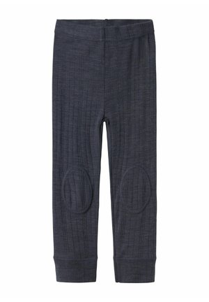 Mørkegrå leggings med ribbet tekstur, der har cirkulære knælapper og en tætsiddende linning, designet til komfort og bevægelsesfrihed.