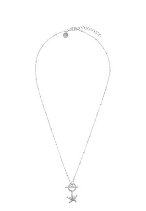 Silver chain necklace with starfish pendant and toggle clasp with adjustable length extension chain.