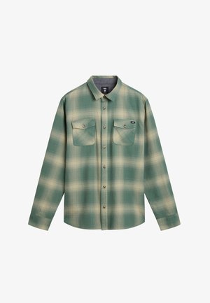 Green and beige plaid long-sleeve button-up shirt with two front buttoned chest pockets and a collar.