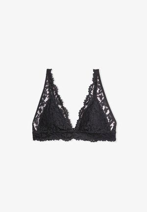 Soutien-gorge à fines bretelles en dentelle noire avec un motif floral, un décolleté en V et des bords festonnés. Le tissu est doux et transparent, offrant un aspect délicat.