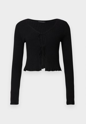 Cardigan court noir côtelé à manches longues avec col en V et deux fermetures à nouer à l'avant, ourlet légèrement froncé, posé à plat sur fond blanc.