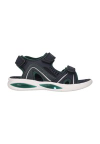 Sandale pour enfants bleu marine et verte à bout ouvert avec brides Velcro réglables et semelle blanche avec accents verts, vue de côté.