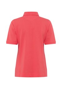 Koral polo t-shirt med korte ærmer, krave og en glat, ensartet tekstur. Ingen mønstre eller synligt hardware. Vist fra ryggen.