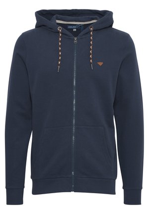 Dunkelblaue Zip-Hoodie aus weichem Material, mit einer Kapuze mit Kordelzug und zwei Vorder Taschen, mit kontrastierenden gemusterten Kordeln und Logodetails.