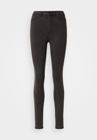 Jeans skinny negros de cintura alta, fabricados en denim elástico, con bolsillos frontales, cremallera y detalles de costura minimalistas.