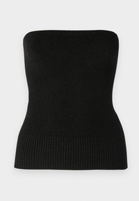 Melna adīta topiņa bez piedurknēm ar gludu faktūru, kurai ir ribota maliņa. Dizains ir pieguļošs, izceļot vienkāršu, minimālistisku stilu.