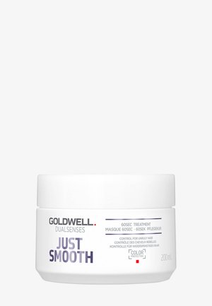Goldwell Dualsenses Just Smooth traitement capillaire de 60 secondes pour cheveux indisciplinés, pot de 200 ml avec protection de la couleur, contenant blanc avec texte violet et noir.