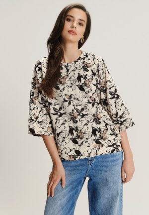 - Bluza