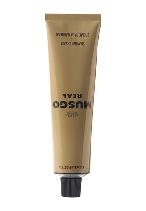 Tube mit Musgo Real Rasiercreme mit schwarzem Deckel auf weißem Hintergrund, beige Verpackung mit schwarzem Text.