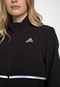 adidas Performance OTR SOFTSHE JKT - Bežecká bunda - black