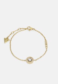 Unselected, yellow gold-coloured