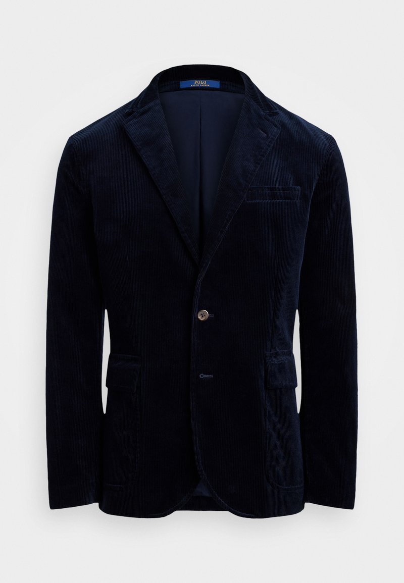 Marinblå kordfløyelsblazer med slagkrage, en knappstängning och två frontfickor. Har texturerad tyg och en slät innerfoder.