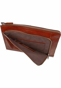 Brown leather clutch with a zip closure. Features a lined interior, two compartments, and a side slip pocket with a textured pattern.