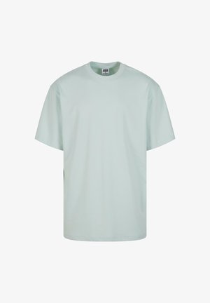 T-shirt azzurro in cotone con maniche corte, collo rotondo e vestibilità rilassata. Tessuto morbido senza motivi o dettagli visibili.