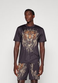 Venum TIGER DRY TECH - Sportiniai marškinėliai trumpomis rankovėmis - black/neo orange