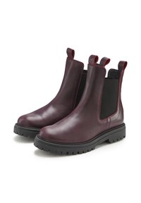 Burgundy leather Chelsea boots featuring elastic side panels, contrasting red stitching, pull tabs, and rugged black rubber soles.