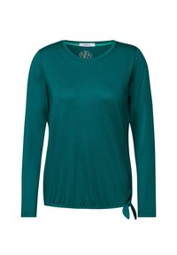 Teal langemouwtop van zachte stof, met een ronde hals en een strikdetail aan de onderkant aan de linkerkant.