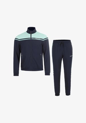 Marineblauwe en licht petrolkleurige trainingsjas met ritssluiting en bijpassende marineblauwe joggingbroek, beide voorzien van ritssluitingszakken en Sergio Tacchini-logo's.