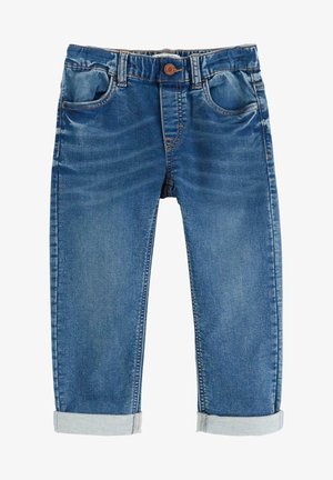 Jeans de ganga azul com um acabamento desbotado, cinco bolsos, punhos enrolados e fecho de botão. O tecido tem uma textura suave e detalhes de costura subtis.